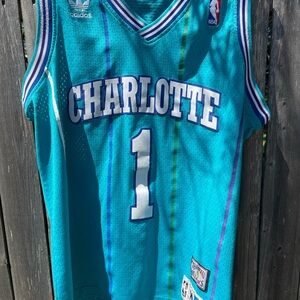Muggsy Bogues Charlotte Hornets NBA jersey retails for $135 new